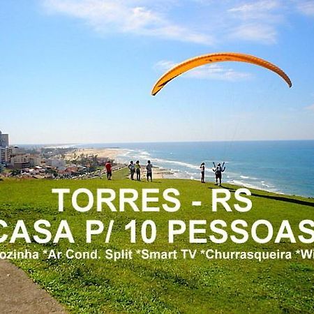 Casa De 2 Quartos Com 2 Ares-Condicionados Em Torres-Rs - Na Mais Bela Praia Gaucha - Cozinha - Banheiro - Tv Smart 32 E Wi-Fi - Estacionamento - Anfitria Superhost No Bnb Villa Exterior foto