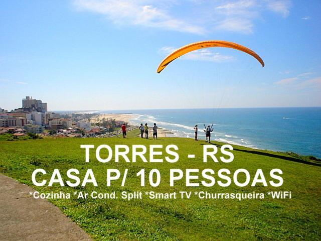 Casa De 2 Quartos Com 2 Ares-Condicionados Em Torres-Rs - Na Mais Bela Praia Gaucha - Cozinha - Banheiro - Tv Smart 32 E Wi-Fi - Estacionamento - Anfitria Superhost No Bnb Villa Exterior foto